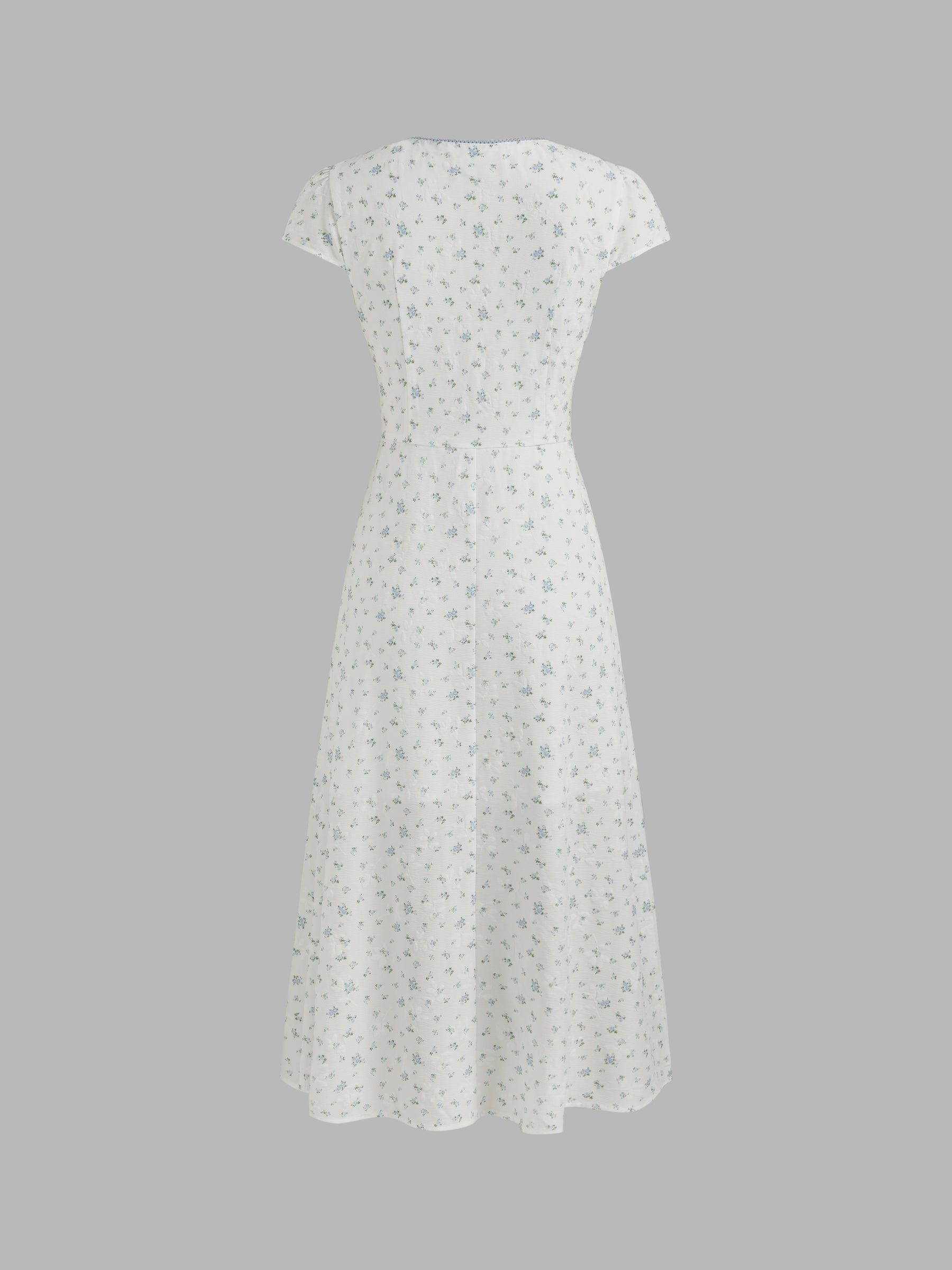 Vestido midi floral con cuello en V y botones